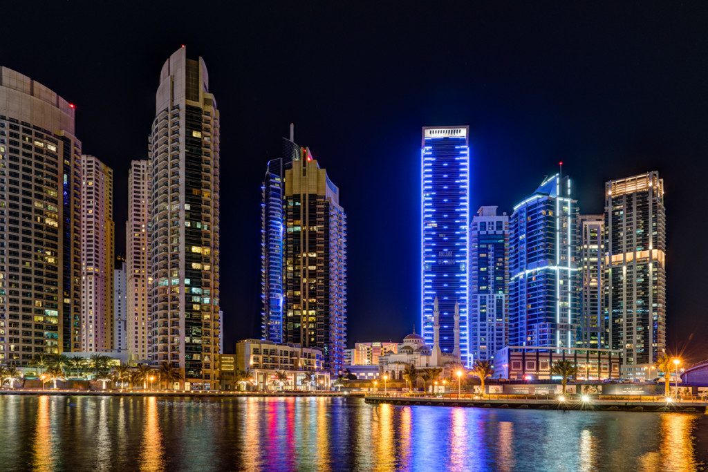 Skyscrapers light up the water over the Dubai Marina.