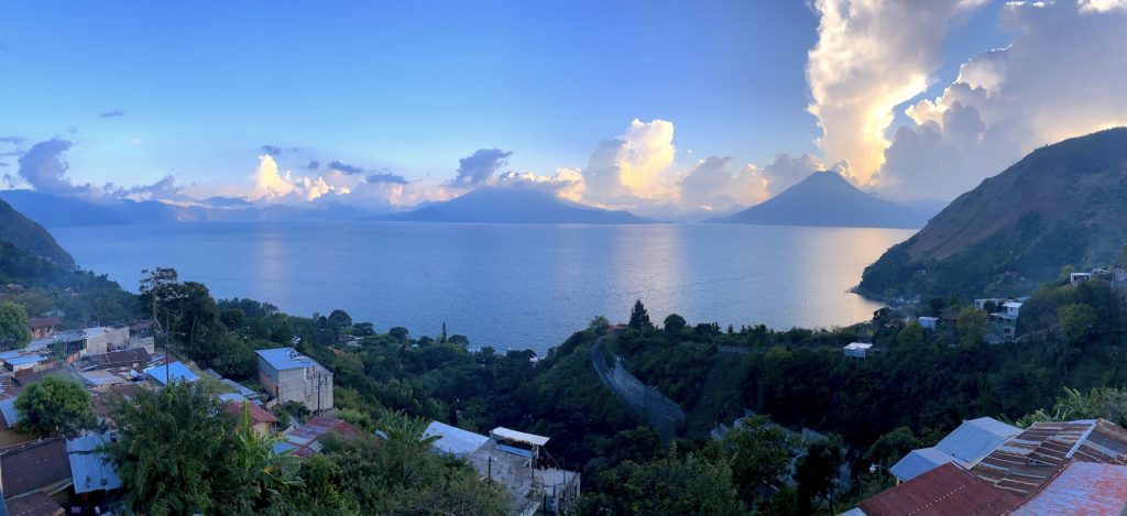 Panoramic view of lake and volcanoes.